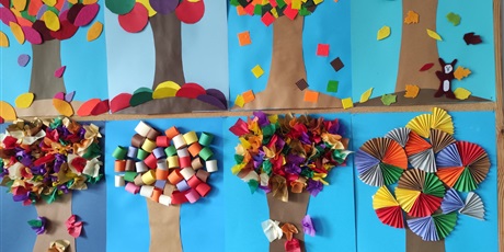 Powiększ grafikę: Kolorowe jesienne drzewa wycięte z papieru wykonane przez uczniów w czasie zajęć świetlicowych